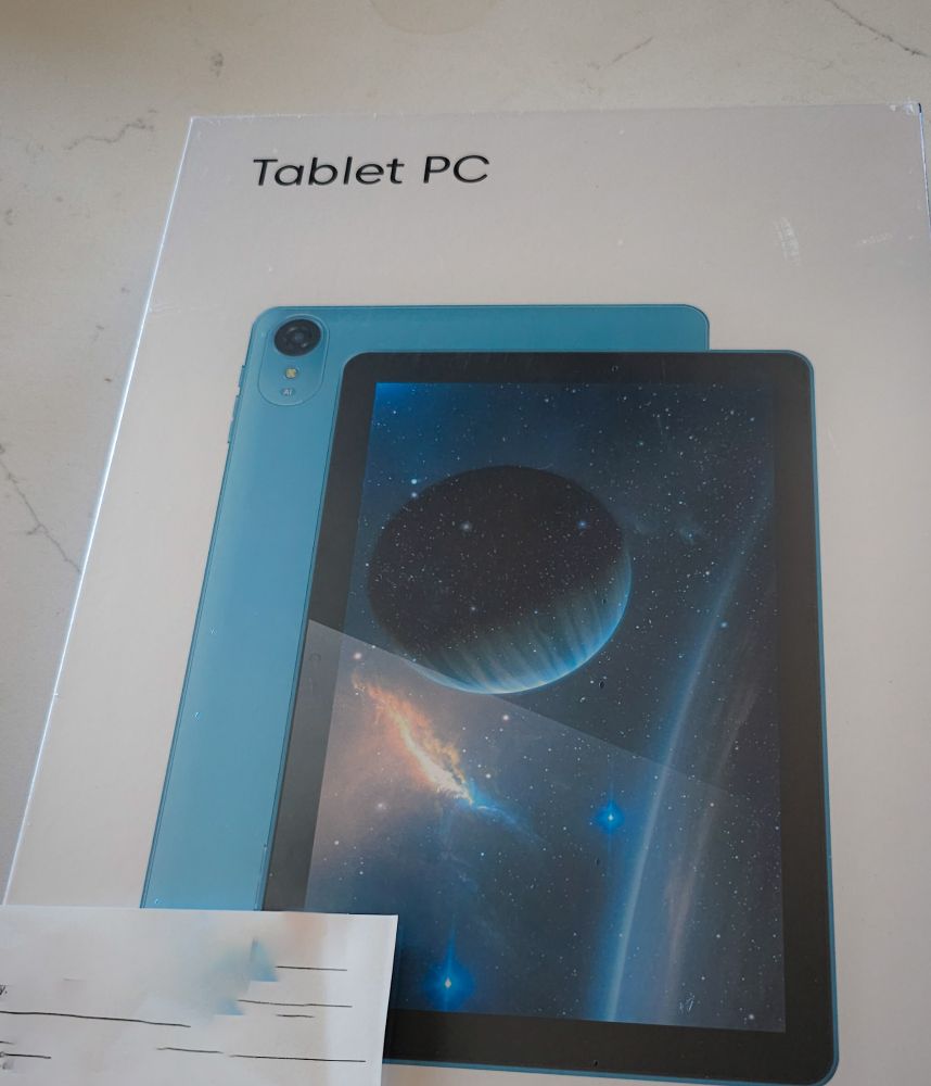 A picture of a brand new tablet in a box.