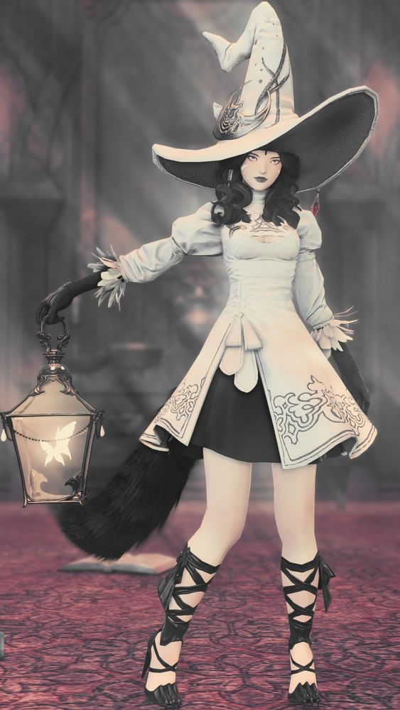 A screenshot from Final Fantasy 14. A female miqo'te holds a lantern containing glowing butterflies. She's wearing a witch costume.