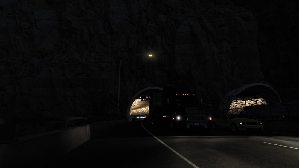 A picture from within American Truck Simulator(ATS) of my truck exiting and driving away from a tunnel.
