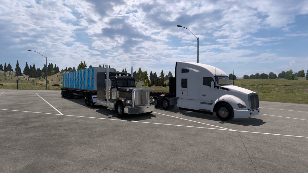 A picture from within American Truck Simulator(ATS) of my truck and trailer resting at a rest stop.