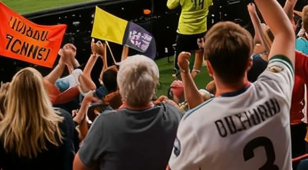 An AI-generated picture of sports fans seen from behind. Their banners and jerseys look like they say actual things, but they do not. 