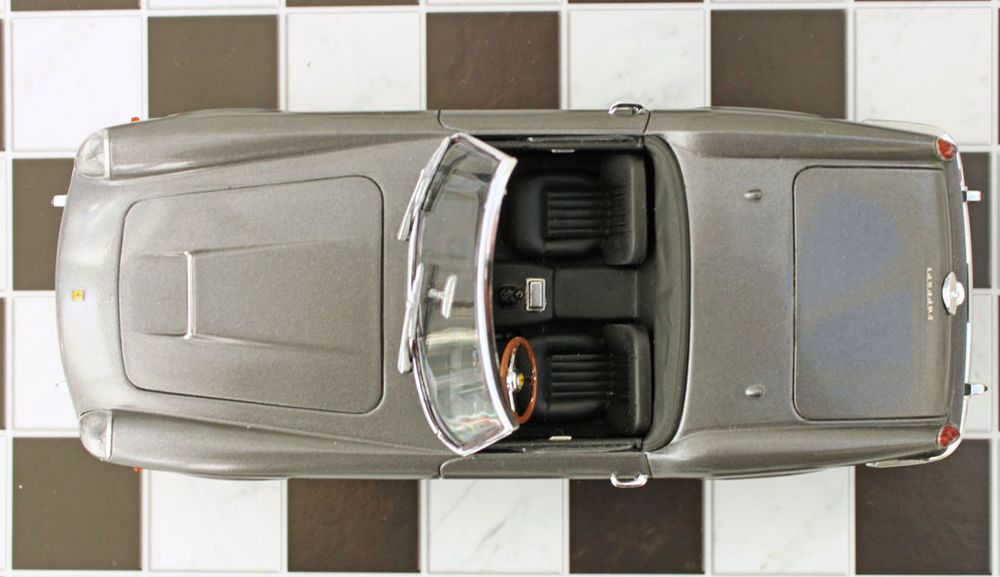 1/24 scale plastic model of a 1961 Ferrari 250GT California Spyder, built from the Academy Kit (labelled 'European Classic Car'!), finished in Metallic Steel Grey with a black interior.  Overhead view.