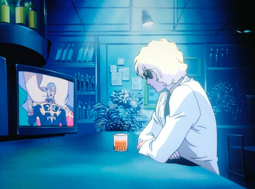 char sitting at a dimly lit bar, he is watching a tv broadcast and has a glass of whiskey