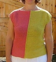 Square shaped top, left half in yellow, right half in pinky orange.
