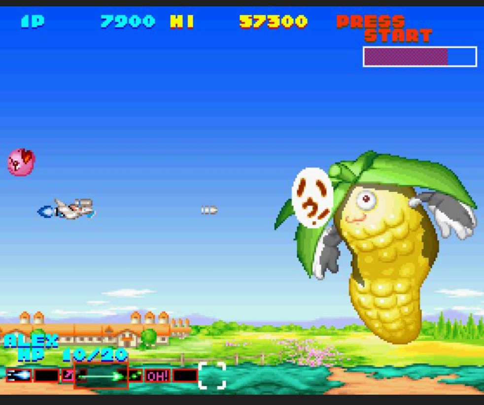 Screenshot of Sexy Parodius on Sega Saturn, the part where you are fighting the giant corn boss from stage 1.