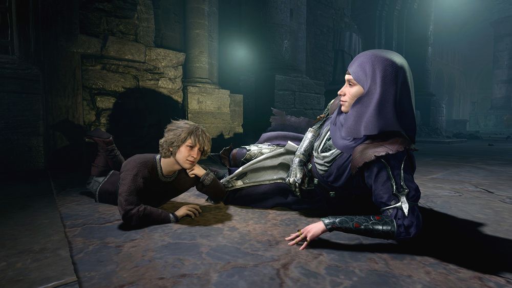 An in-game screenshot, edited slightly in GIMP, of my durge Amarie sitting on the floor with her son Emir. Amarie is an elf with a pallid skintone and visible facial scars, and is wearing a large purple wimple. She is wearing gray and purple robes over dark armor; in addition to this, she is also wearing two large pauldrons that resemble the pauldrons Withers wears in-game. Emir is a half-elf child with wavy light brown hair, and is wearing a dark mauve colored shirt, gray pants, and dark mauve boots. Emir is slightly to the left of the center of the frame while Amarie is slightly to the right of him. They are both laying down on the floor of Jergal’s temple and have happy/amused expressions on their faces.