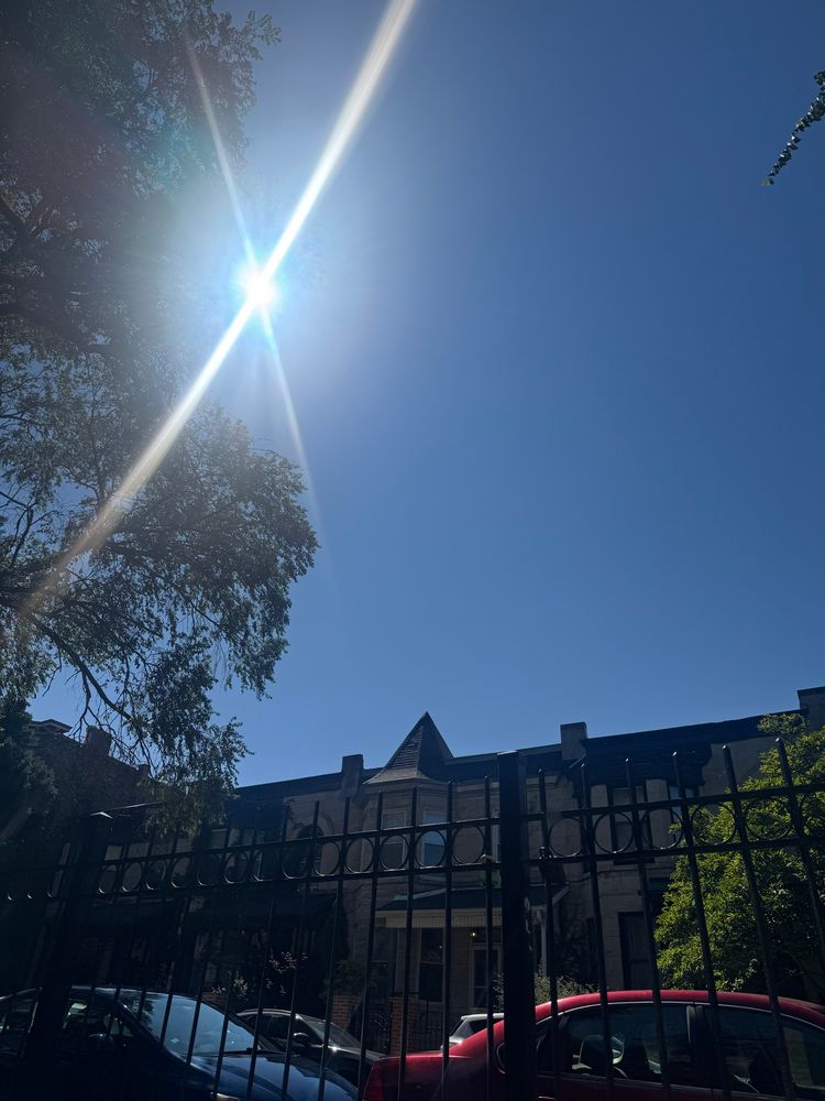 a cloudless blue sky with the sun shining