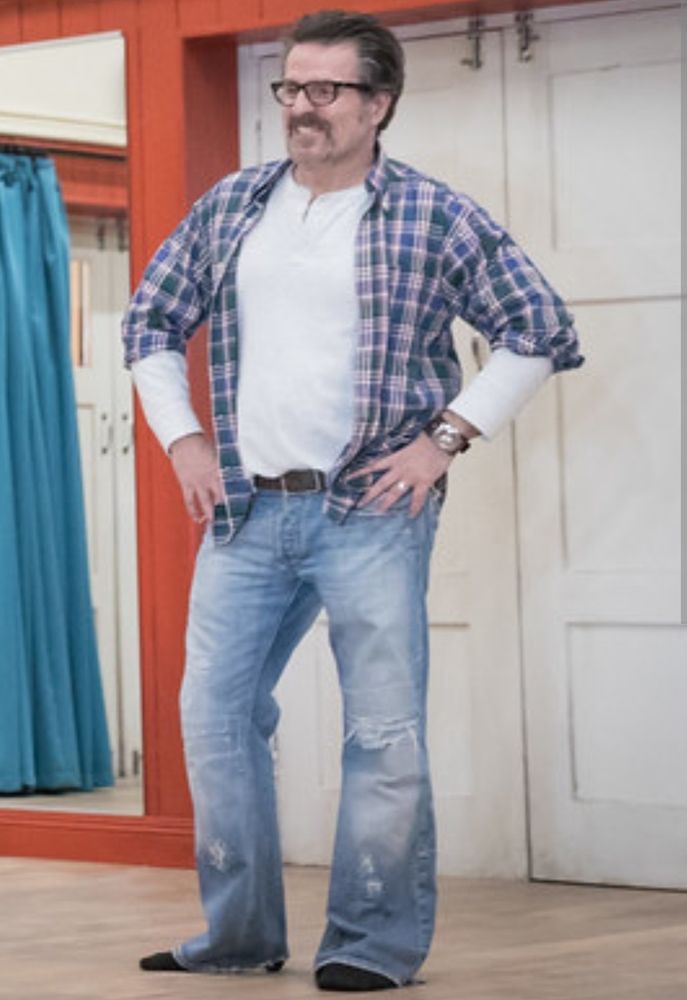 Con O'Neill during a rehearsal with his hands on his hips.