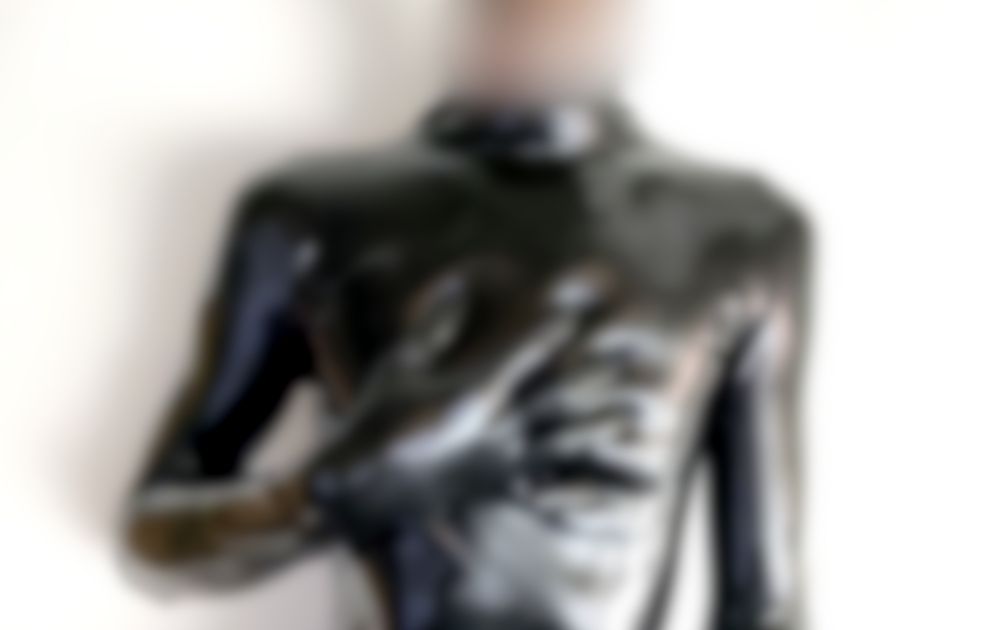 blurry body wearing black rubber