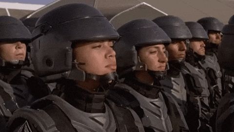 Clip from the movie Starship Trooper:   solder turning to camera and saying "I'm doing my part" as part of an in-film propaganda reel