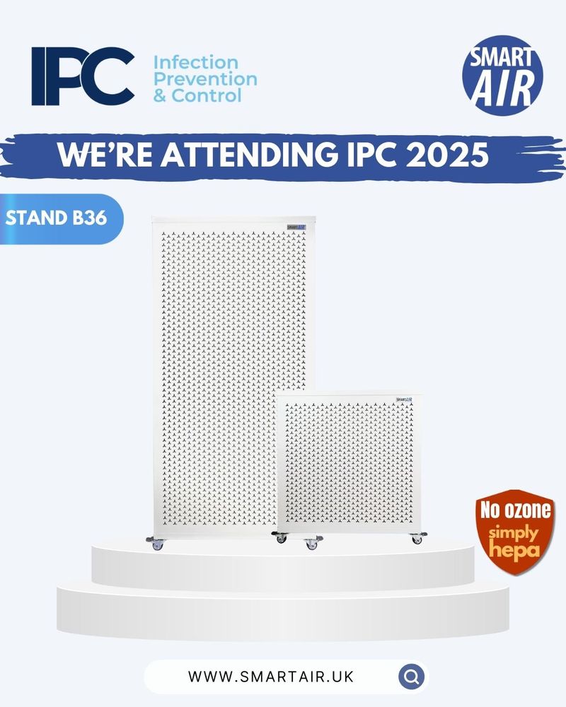 Smart Air announcement for IPC 2025. Features the Blast and Blast Mini air purifiers on a podium, with text stating 'We're attending IPC 2025' and 'Stand B36.' Includes 'No ozone, simply HEPA' badge, Smart Air logo, and website link.