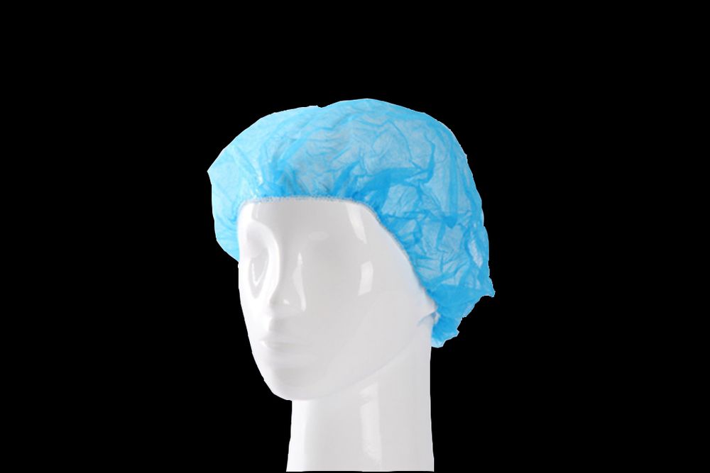 Une charlotte posée sur une tête de mannequin 