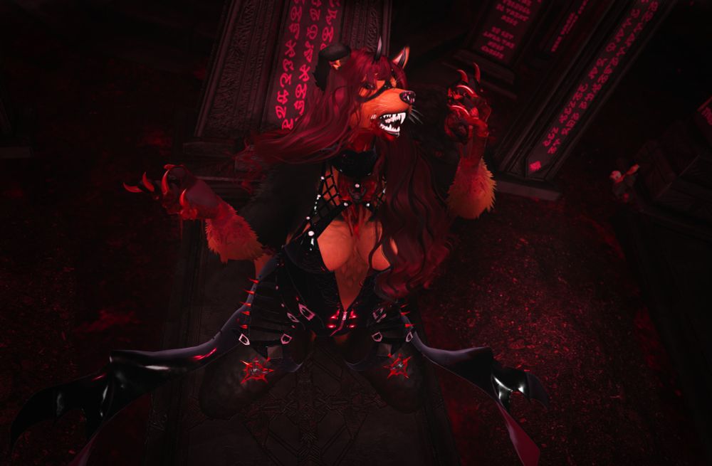 A demonic german shepherd/husky mixed anthro gal. She has soulless dark red eyes, scarlet hair with a black streak running through it and two black horns poking from her forehead. She is crouching over a grave, holding up a heart ready to be eaten. She is wearing a tight latex outfit, adorned with spikes, buckles and skull charms. She has blood running down her chest and hands.