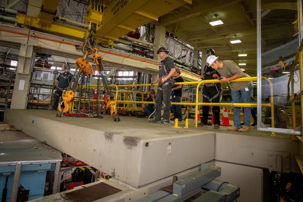 The rigging team prepares and moves Roof Blocks 74 and 76 at the Advanced Light Source (ALS) Sector 12 area, as part of the Summer 2025 shutdown work on the ALS Upgrade project, at Lawrence Berkeley National Laboratory (Berkeley Lab).