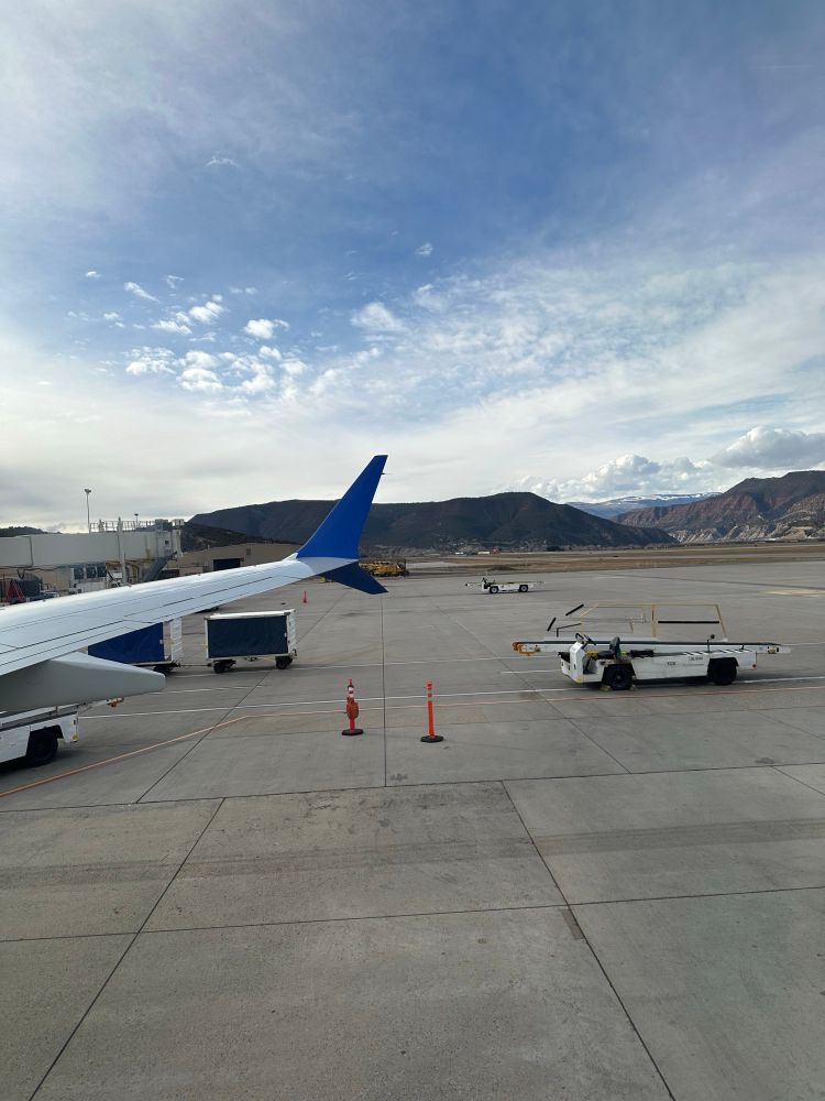 Wing tip from plane window. 