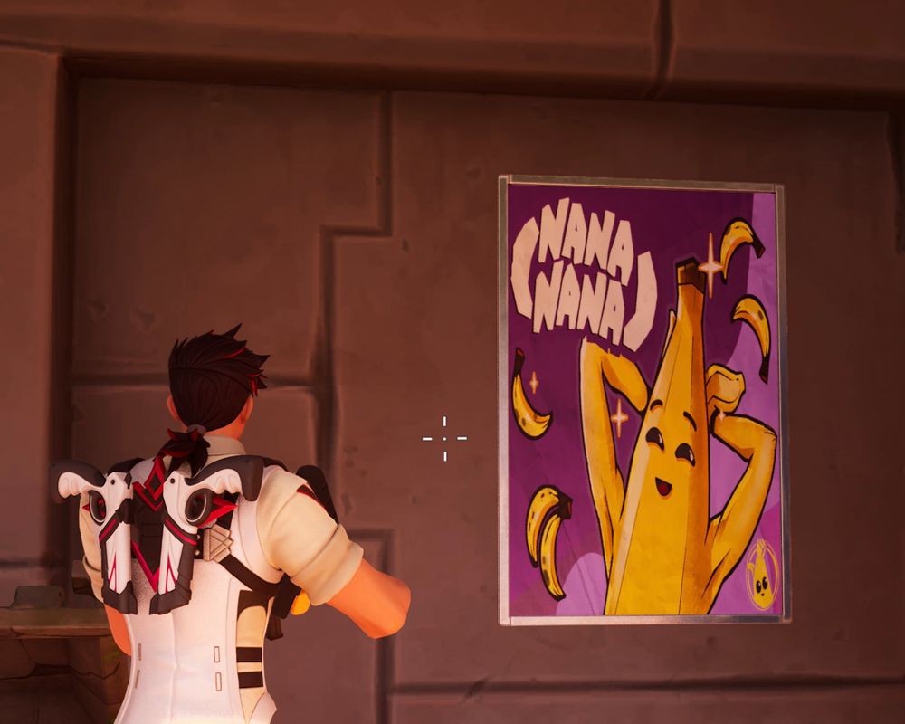 A screenshot of the game Fortnite by EPIC games. The player is looking at a poster of the Banana Character, Peely, proudly displaying his armpits.