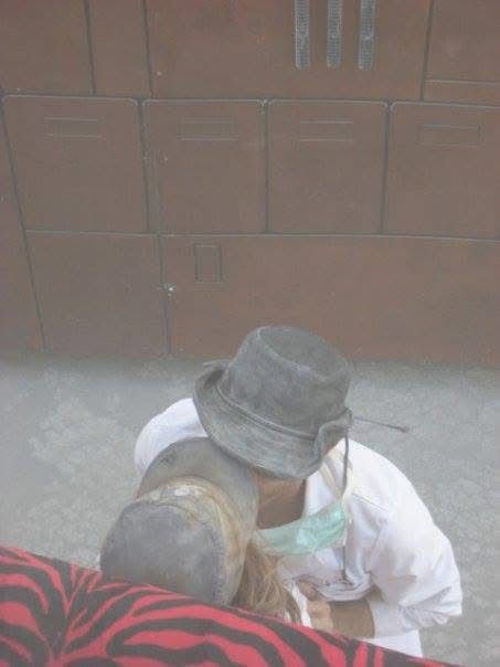 A couple making out in the shadow of a sand crawler at Burning Man 18 years ago. 