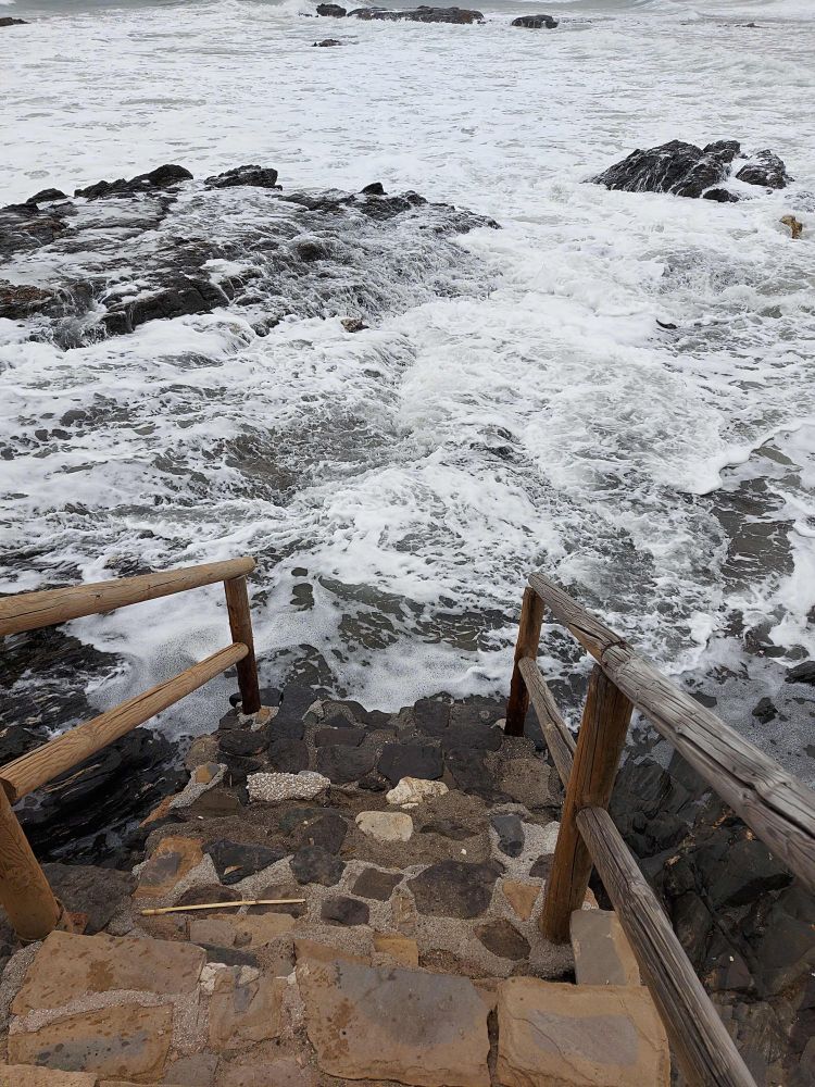 High waves and stairs in Benalmádena (Spain)