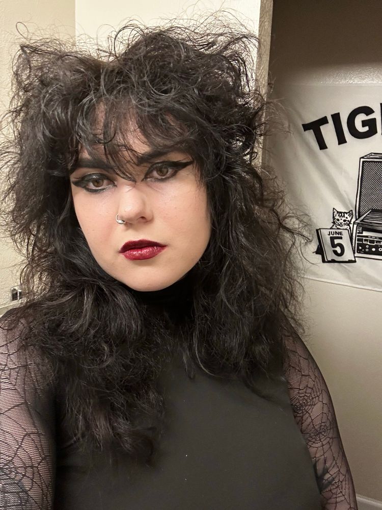 another selfie of the same goth white femme but in this one, i’m looking straight on/into the camera  