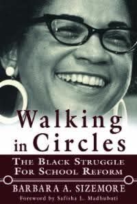 Book cover for Walking in Circles includes a black and white photo of a smiling woman wearing black rimmed glasses and large hoop earnings 