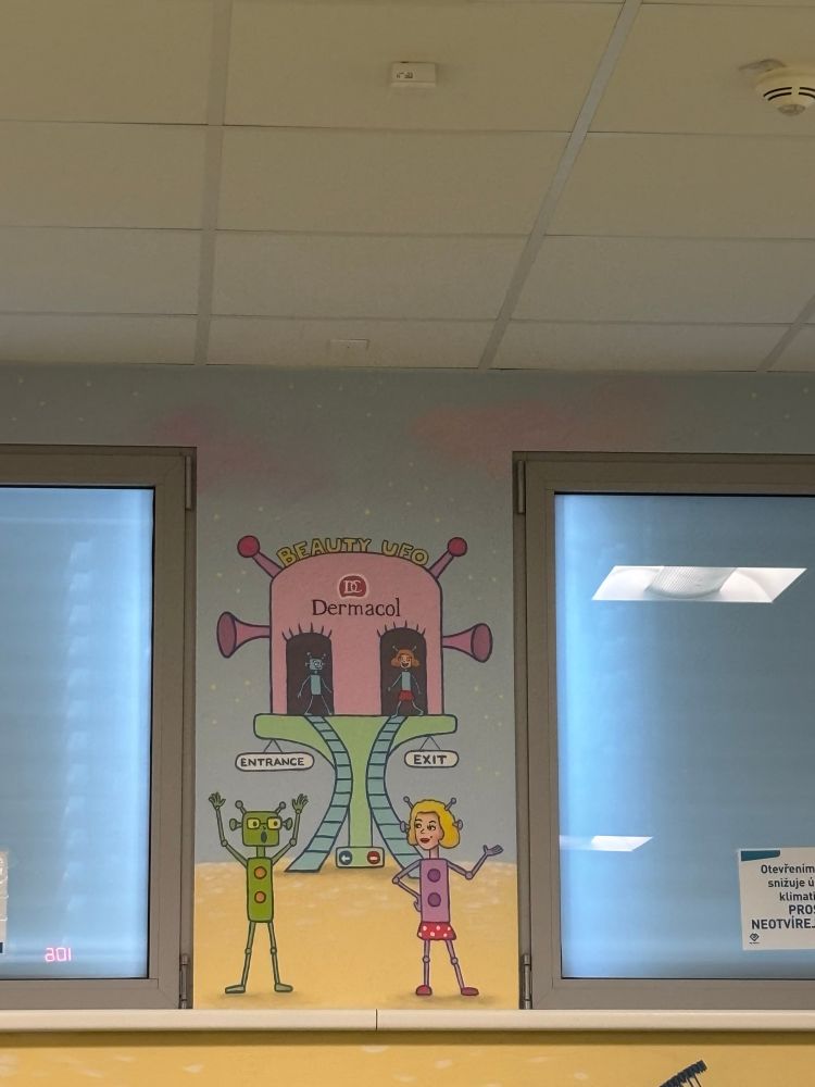 “Beauty UFO” where it appears that a green alien enters and a blond girl exits 
