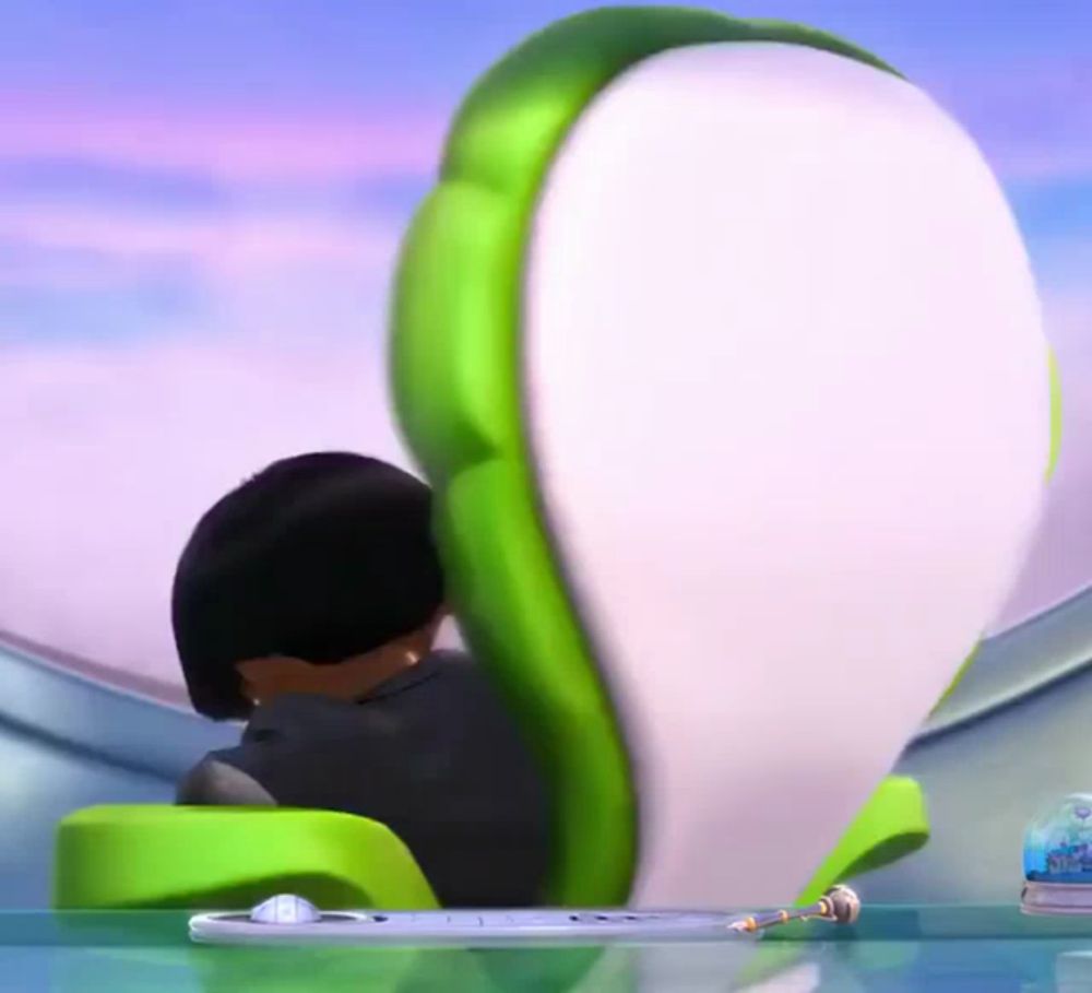 a cartoon character sits in a green chair with a white cushion