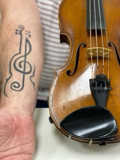 Stefan’s arm and 1870-odd violin. 