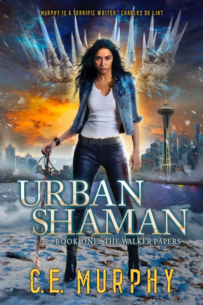 The fabulous new cover to CE Murphy's URBAN SHAMAN features the heroine Joanne Walker gazing straight at the camera, a sword in hand and Seattle and a crown of bones in the background.