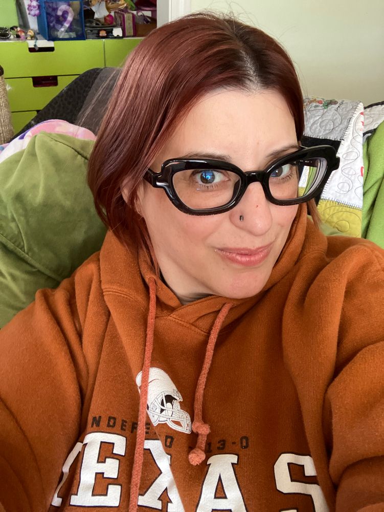 I am wearing a Texas sweatshirt. So much for not engaging.