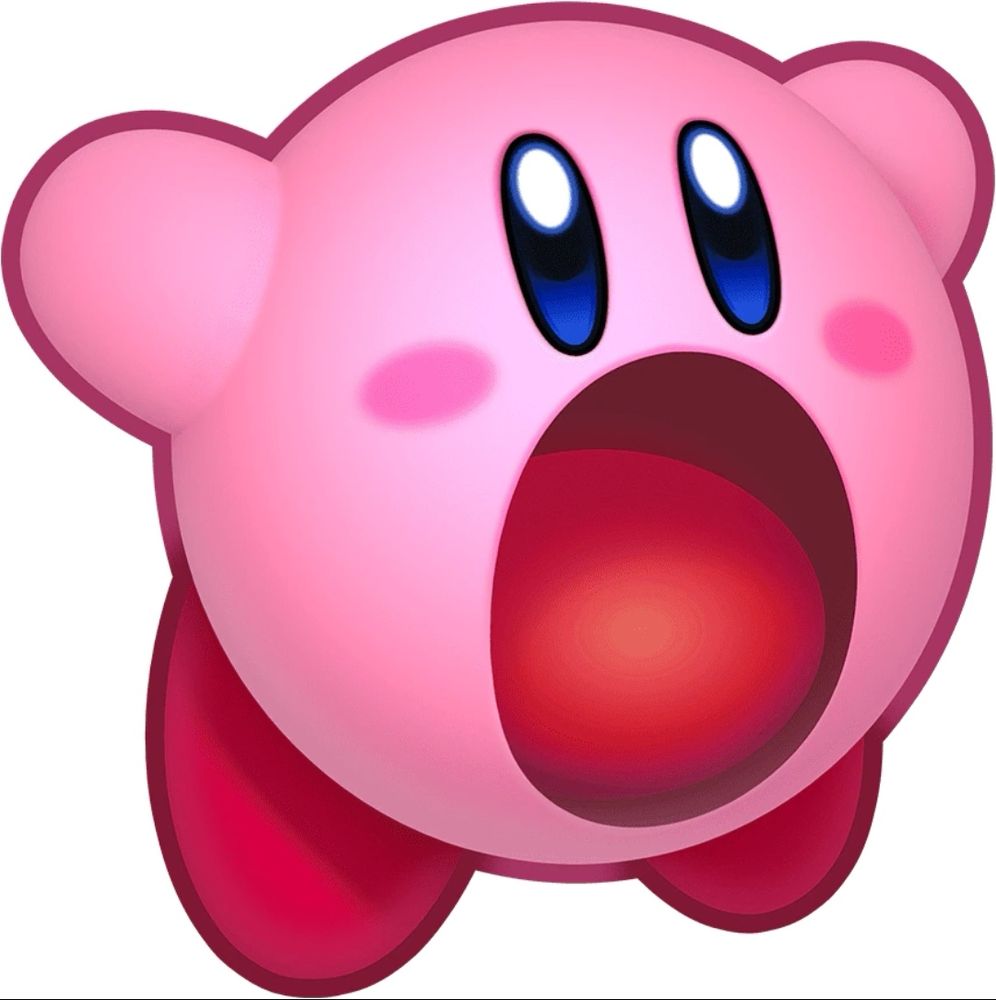 Picture of Kirby with it's mouth open ready to eat all kinds of things. 