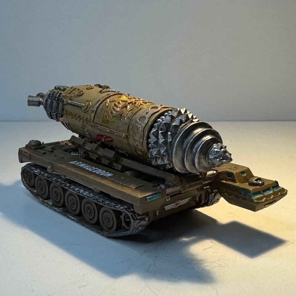 A left side on view of a Hellbore - a large tunnelling machine on a tracked carrier - from Epic 40k painted in Steel Legion colours. 