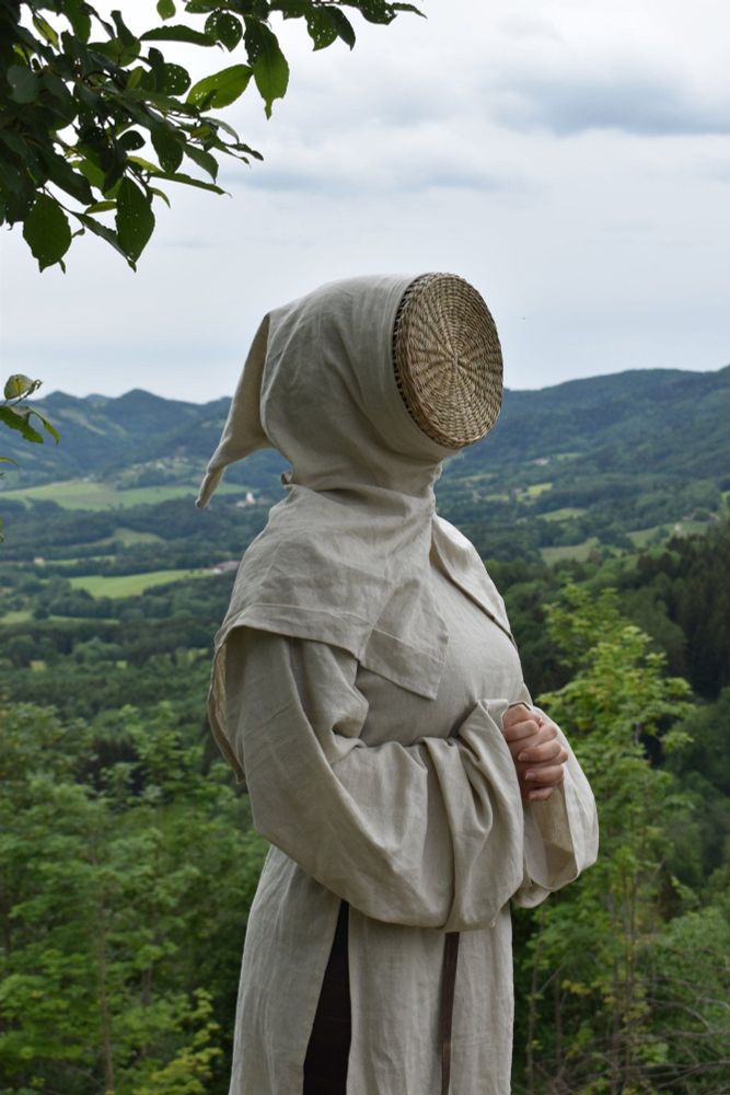 A very cool wicker-faced medieval beekeeper outfit.