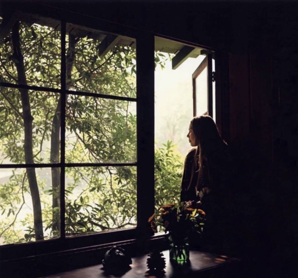 Joni Mitchell at her window in Laurel Canyon