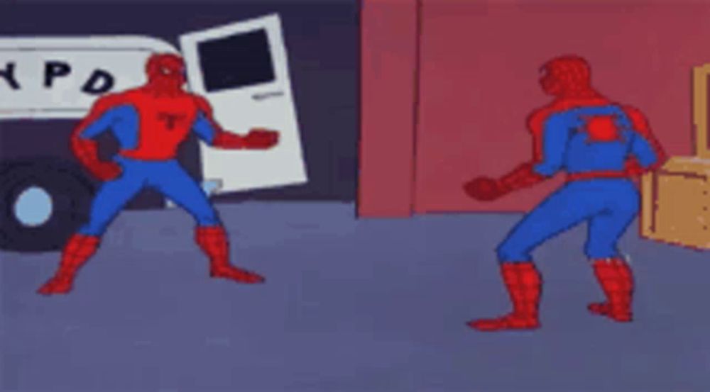 two spider men are standing next to each other in front of a white van that says xpd