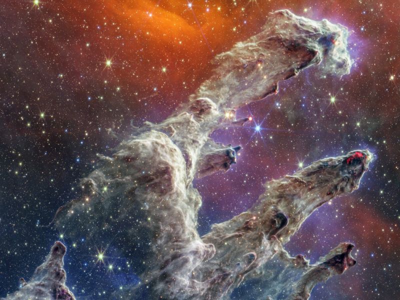 NASA's James Webb Space Telescope (JWST) captured this image of the iconic Pillars of Creation, a small region filled with newly formed stars within the vast Eagle Nebula about 6,500 light-years away.
Photograph by NASA, ESA, CSA, STScI

Source: https://www.nationalgeographic.com/science/article/origins-of-the-universe