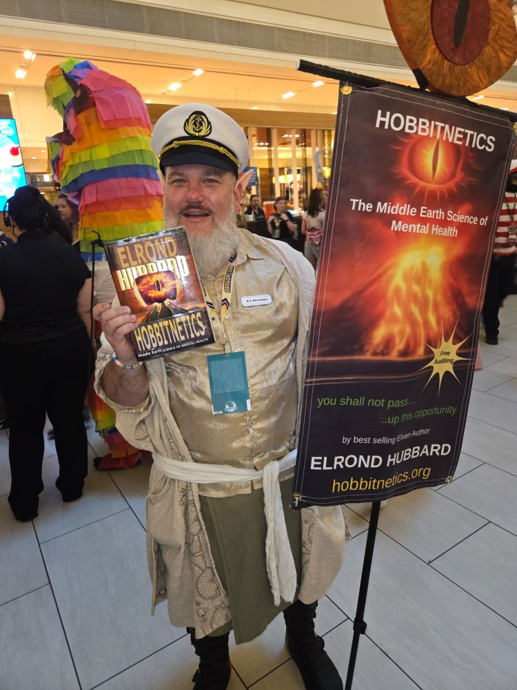 Elrond Hubbard with Hobbitnetics sign. 