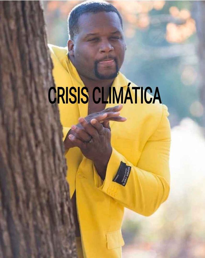 Meme de hombre negro con chaqueta amarilla que se frota las manos con la etiqueta #CrisisClimática