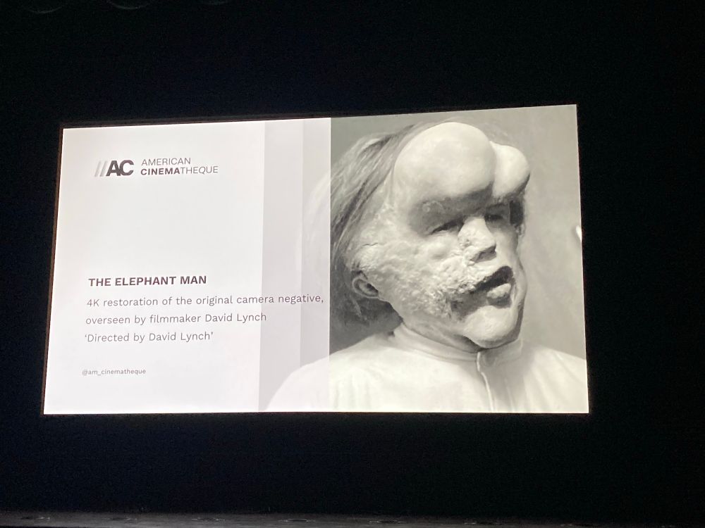“American Cinematheque

The Elephant Man

4K restoration of the original camera negative, overseen by filmmaker David Lynch

‘Directed by David Lynch’

@am_cinematheque”

Pictured to the right of the text is John Hurt portraying John Merrick, “The Elephant Man”, in the film of the same name, directed by David Lynch and released in 1980.