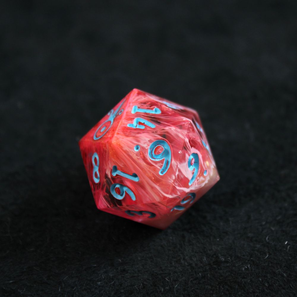 A single bright orange-pink d20 with bright blue numbers. It has streaks of different shades of pink and orange in it, and the die is resting on a black background.