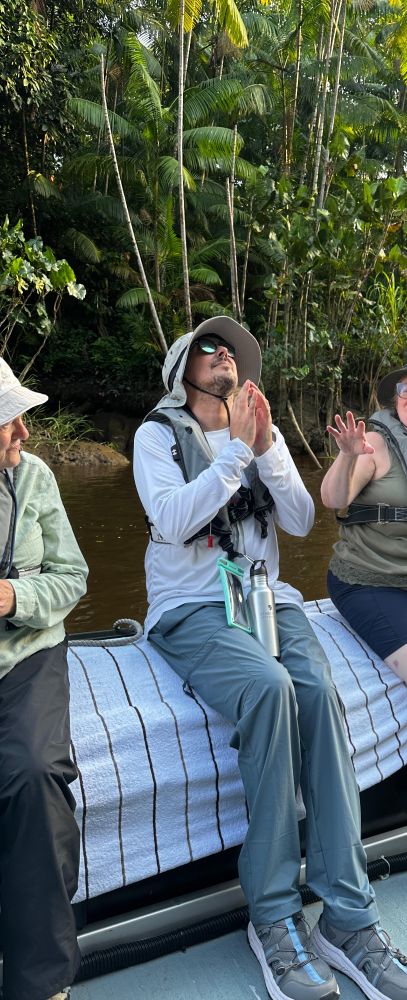 Me looking up at the trees while on a Zodiac 