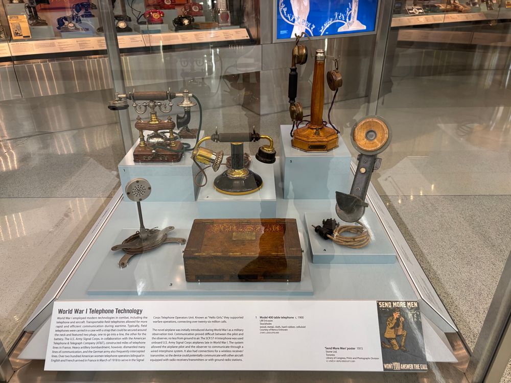 Photo from SFO of an exhibit showing four of the very first phones sold.