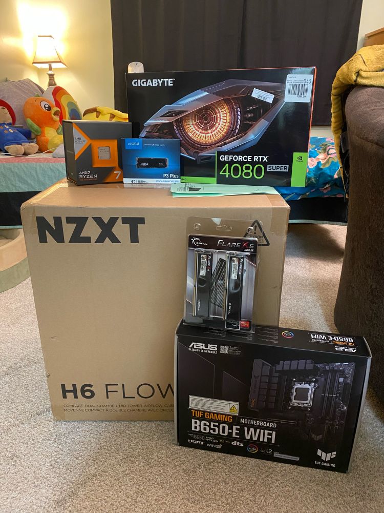 New computer components consisting of AMD Ryzen 7 7800X3D, ASUS TUF Gaming B650-E Mobo, G. Skill Flare X5 32GB DDR5 RAM, Crucial P3 Plus 4TB M.2 SSD, Gigabyte WINDFORCE V2 GeForce RTX 4080 Super 16GB Video Card, NZXT H6 Flow RGB ATX Mid Tower Case