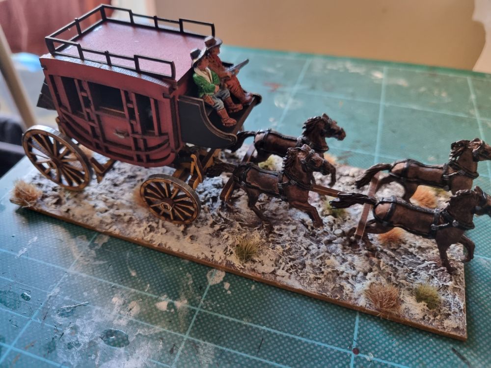 Painted stagecoach for dead man's hand.