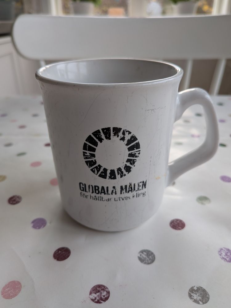 Mugg med text Globala målen för hållbar utveckling 