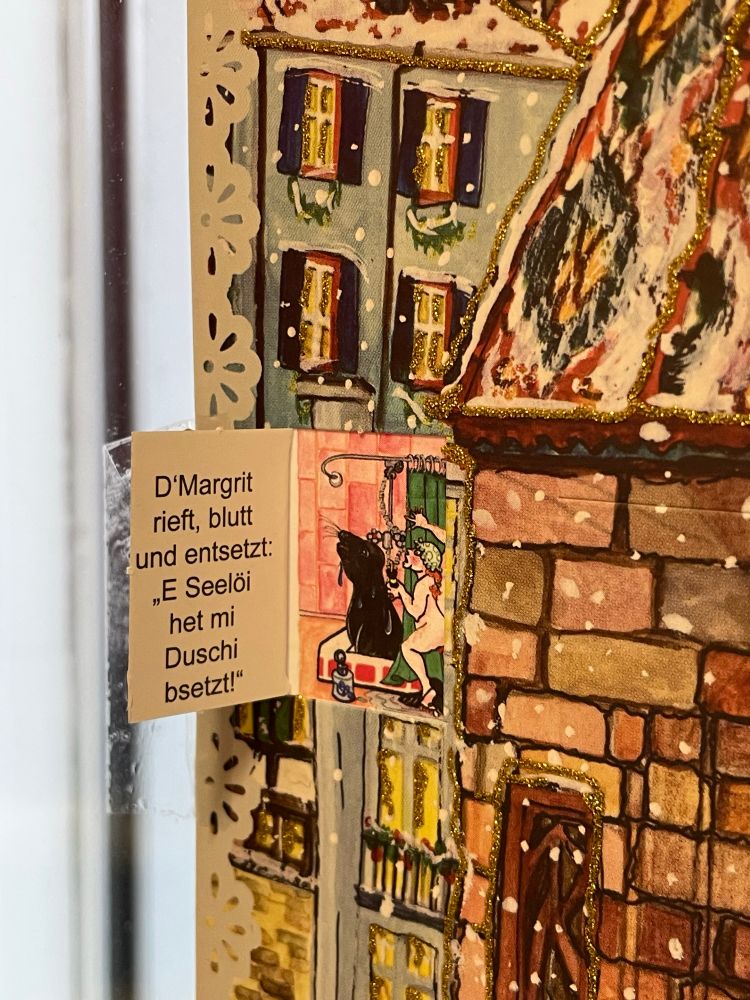 Text-: dMargrit rieft, blutt und entsetzt: ‚E Seelöi het mi Duschi bsetzt!‘