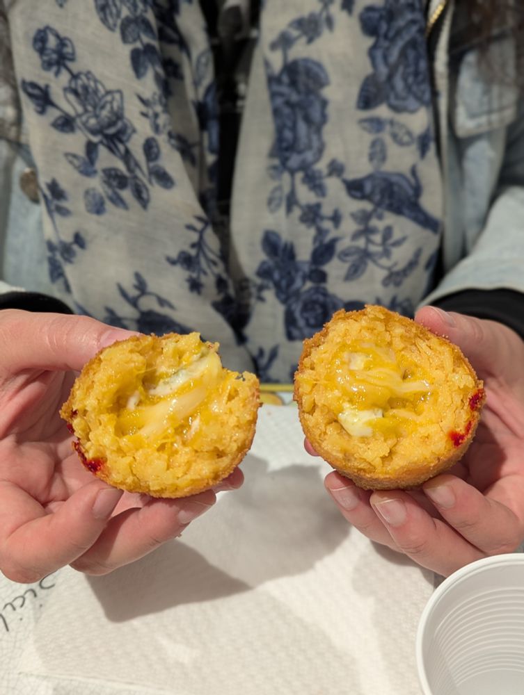 An open arancini with pumpkin and gorgonzola