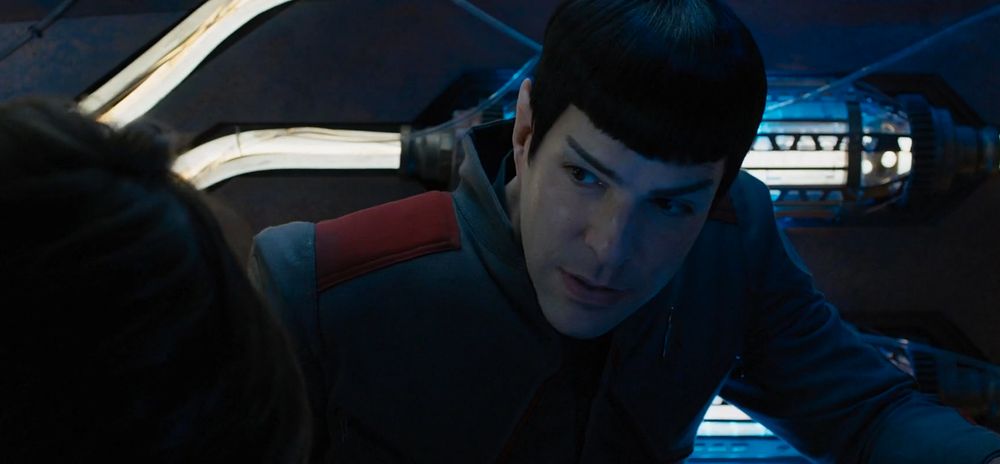 Star Trek Beyond screenshot, same scene, now focused on Spock, who is looking intensely at Kirk, whose head is visible in the foreground. Spock appears to be coming to some kind of realisation based on what Kirk has just said.