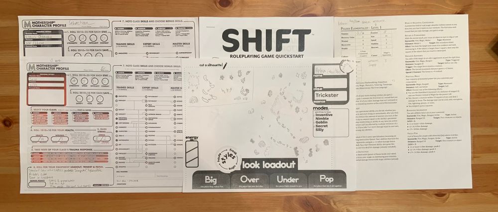 Two Mothership character sheets, the SHIFT RPG QuickStart, a Big Grave Fashion Fantasy character sheet, and a Draw Steel character sheet. 