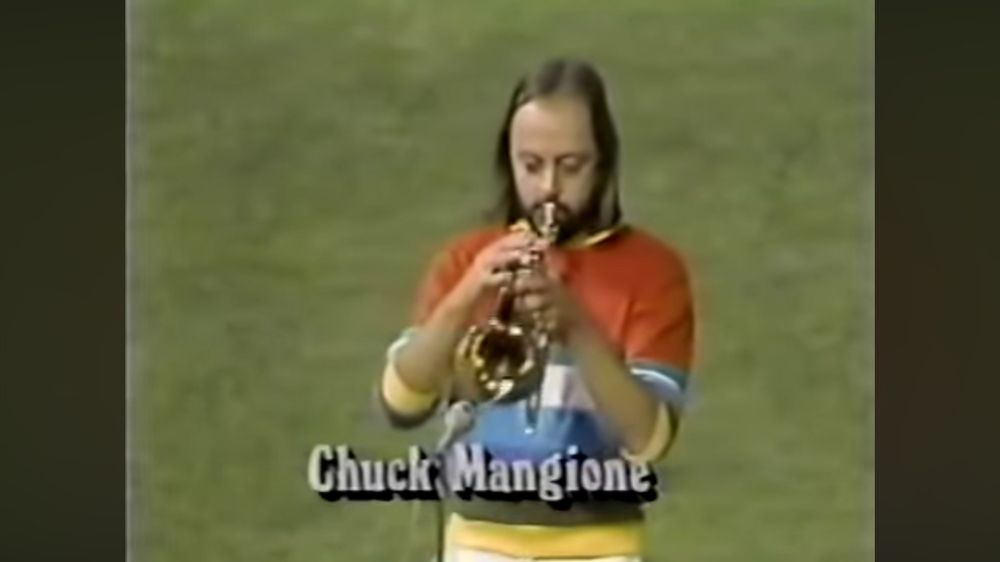 Chuck Mangione plays the Star-Spangled Banner before Game 2 of the 1983 ALCS