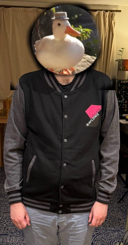 Man with duck for a face wears EPIC SAVLONIC JUMPER